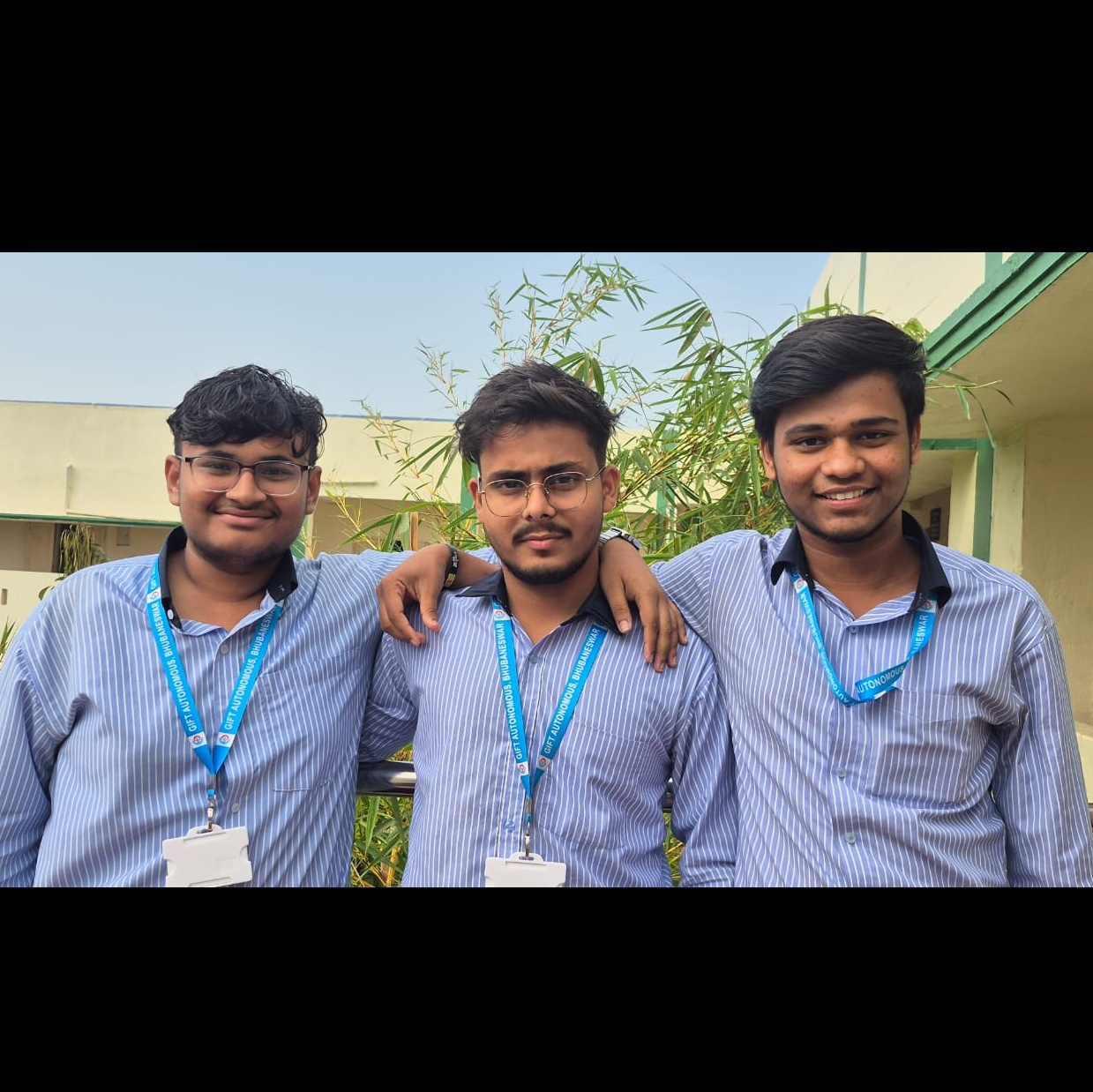 Topper Student with faculty members